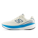 White running shoe with blue sole on a white background