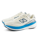 White running shoes with blue sole on a white background