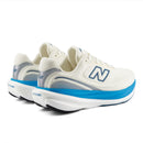 White running shoes with blue accents on a white background