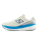 White running shoe with blue sole on a white background