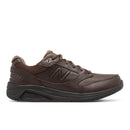 Brown shoe with New Balance logo on a white background