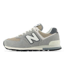 Gray sneaker with white accents on a white background