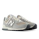 Pair of gray New Balance sneakers on a white background
