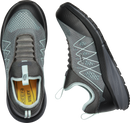 Gray and black KEEN utility shoes on a white background