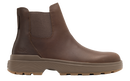 A brown leather Chelsea-style ankle boot with a thick brown sole, shown in a side profile on a white background. The brand name 'Kizik' is embossed on the heel.