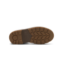 A brown rubber shoe sole viewed from the bottom, featuring a textured tread pattern and a circular embossed logo on the heel, set against a plain white background.