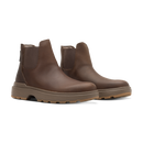 A pair of dark brown leather Chelsea boots with elastic side panels and chunky lug soles, shown on a clean white background.