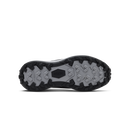 The outsole of a hiking shoe shown from a bottom-up view, featuring a black treaded edge and a gray center with a black hexagonal logo.