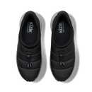 A pair of black slip-on sneakers shown from a top-down view on a white background. The shoes feature a quilted upper, a black tassel detail on the front, and the brand name 'kizik' printed on the insole.