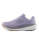 Purple running shoe with New Balance logo on a white background