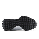 Brown textured sole of a shoe on a white background