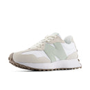 Multicolored sneaker with white, green, and beige tones on a white background