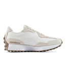 White and beige sneaker with 'New Balance' branding on a white background