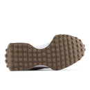Close-up of a shoe sole with textured pattern on a white background