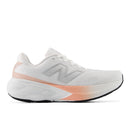 White and pink running shoe on a white background
